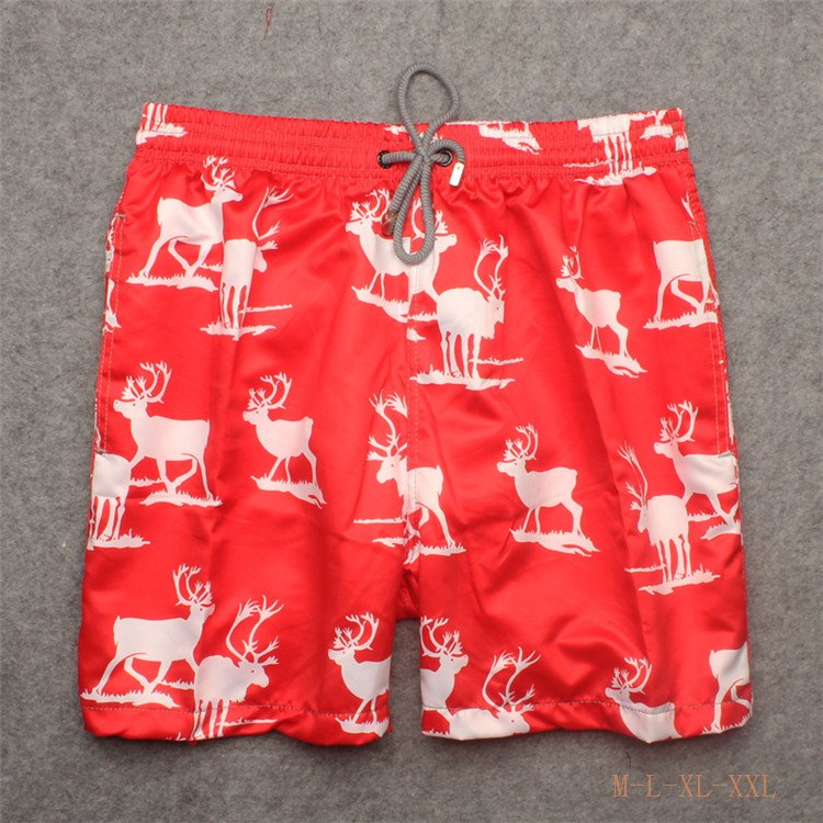Red printed kids board shorts with elastic waist