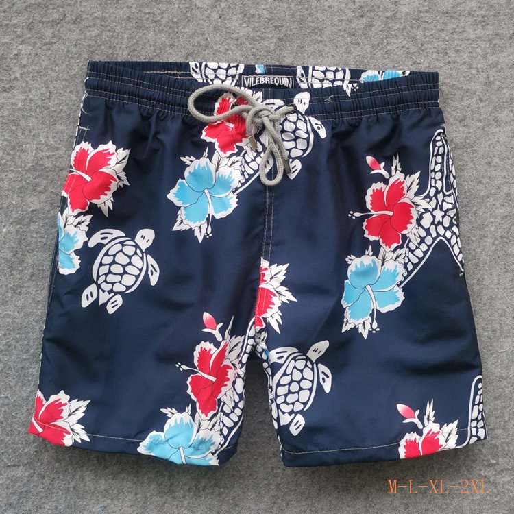 Navy turtle print board shorts